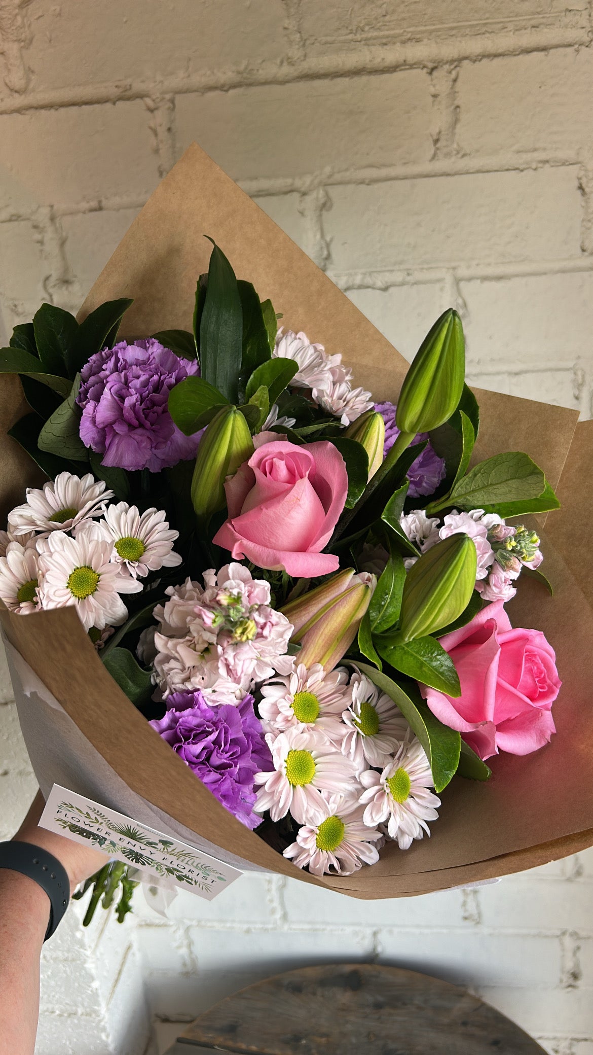Mixed tones for pinks and purple no orchids available this weekend
