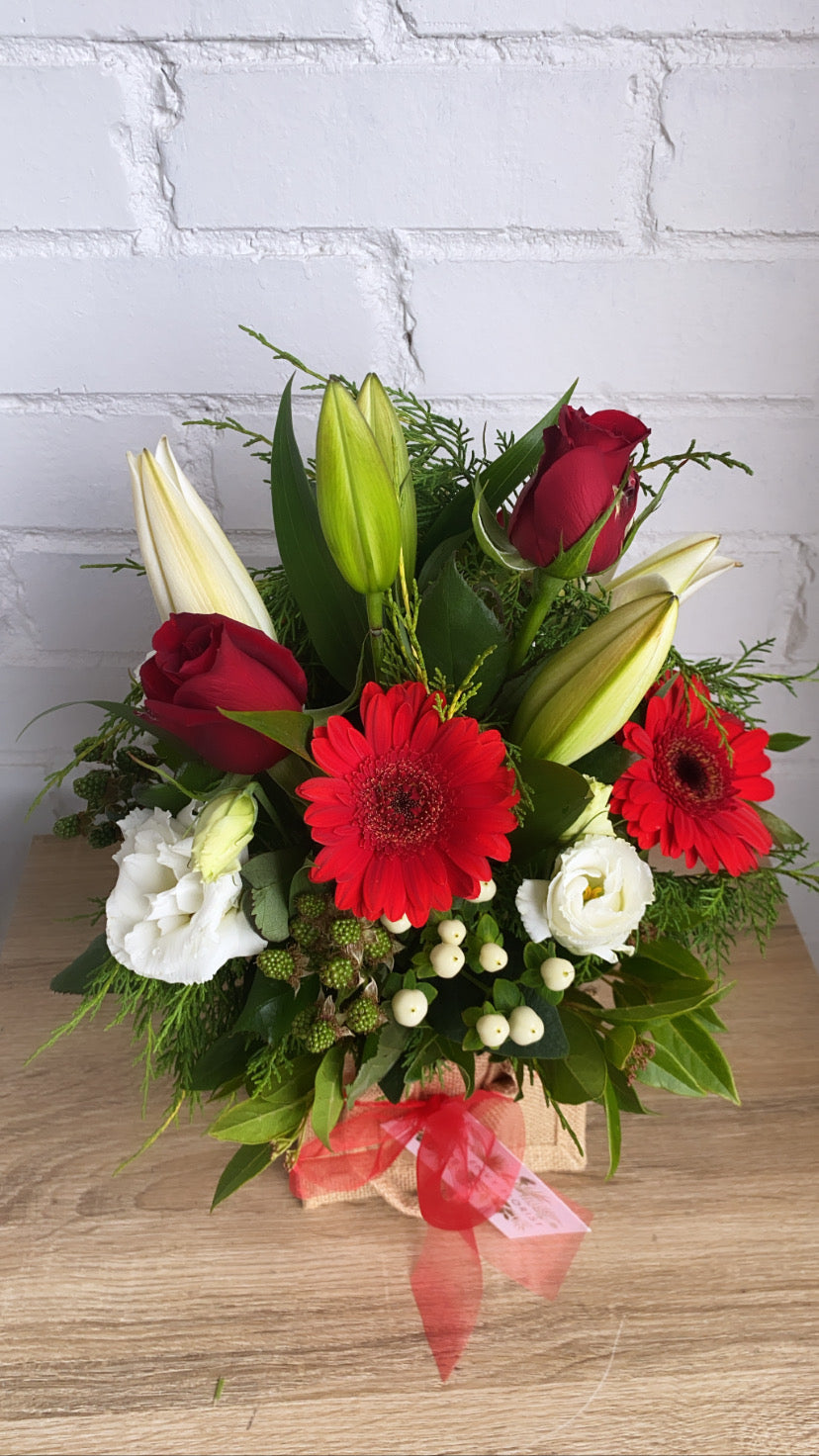 Christmas bag of flowers. florist choice