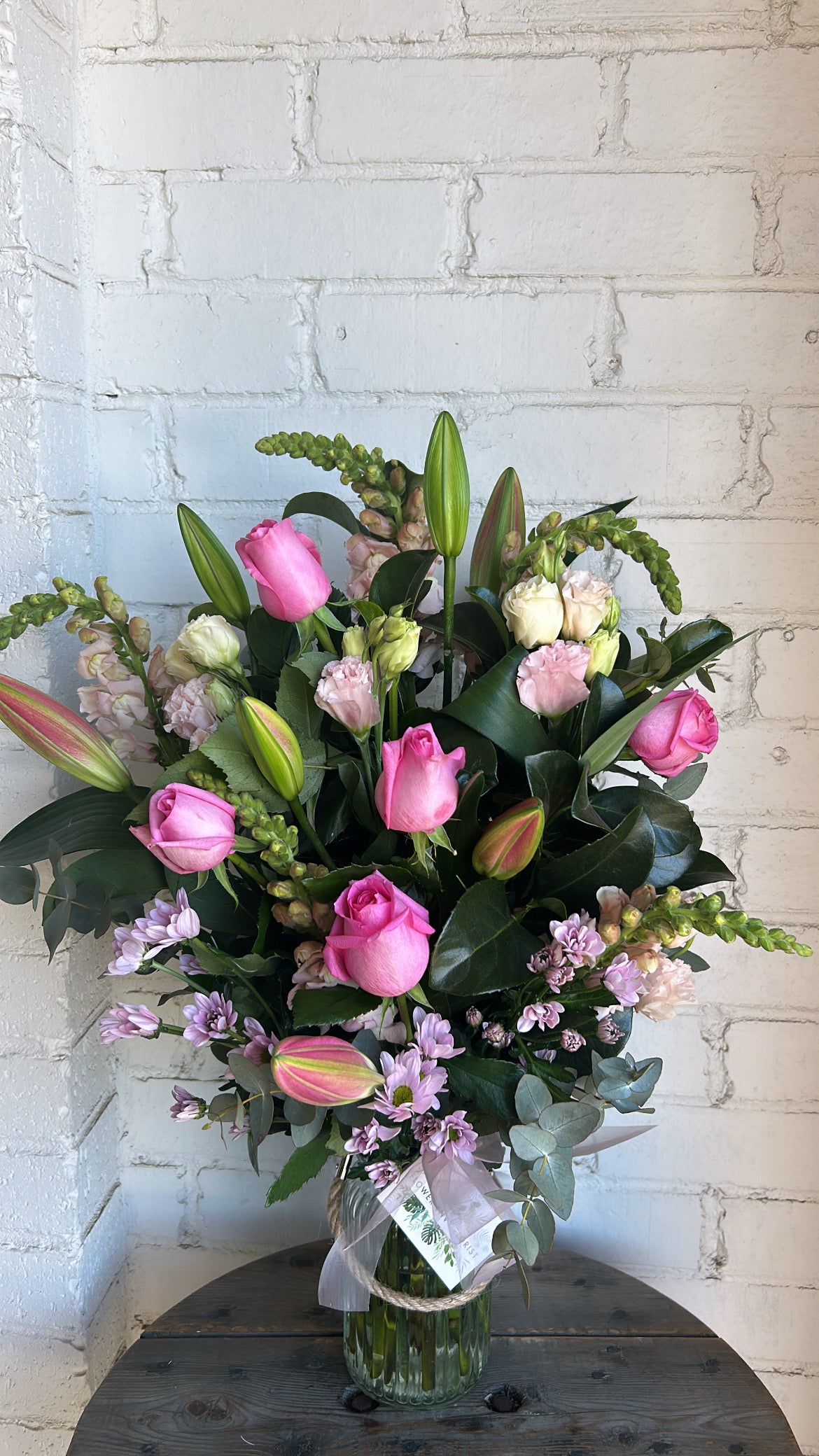 Roses, Lilly and seasonal flowers in a  vase