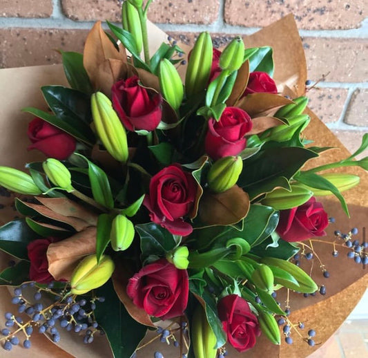 Love is in the air. All round Red Roses and Lilly’s bouquet