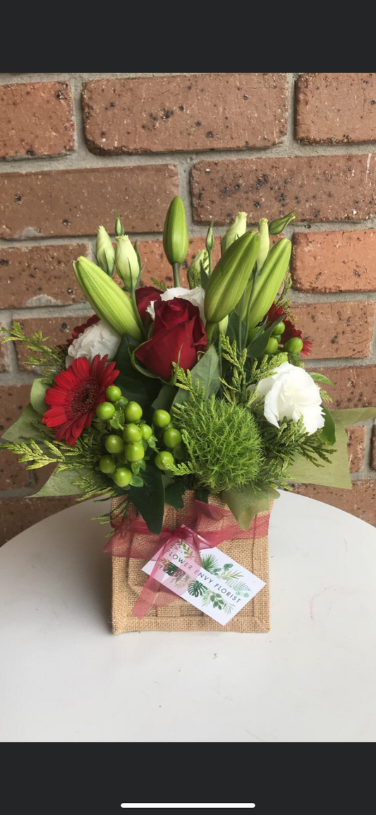 Christmas bag of flowers. florist choice